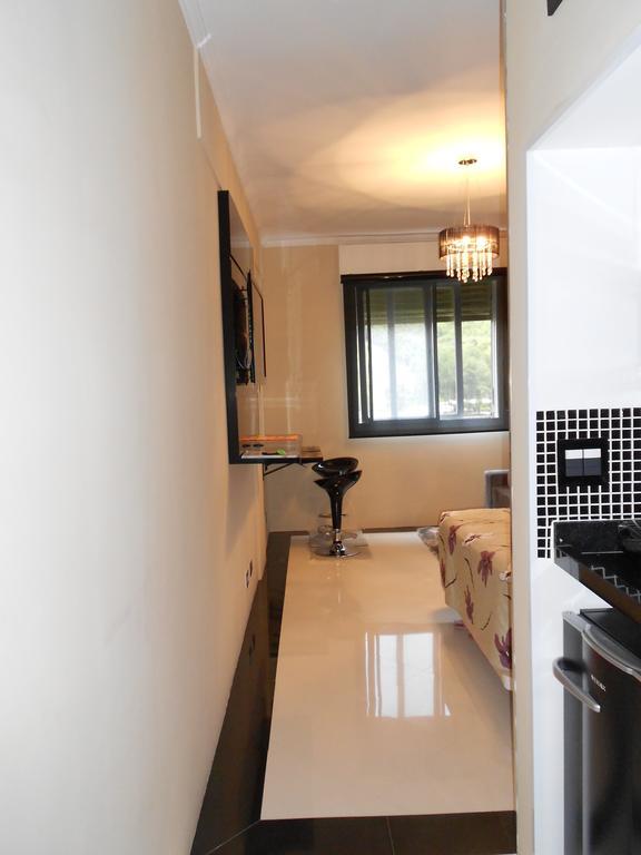 Flat No Hotel Cavalinho Branco อากวัสจิลิงดอยา ห้อง รูปภาพ