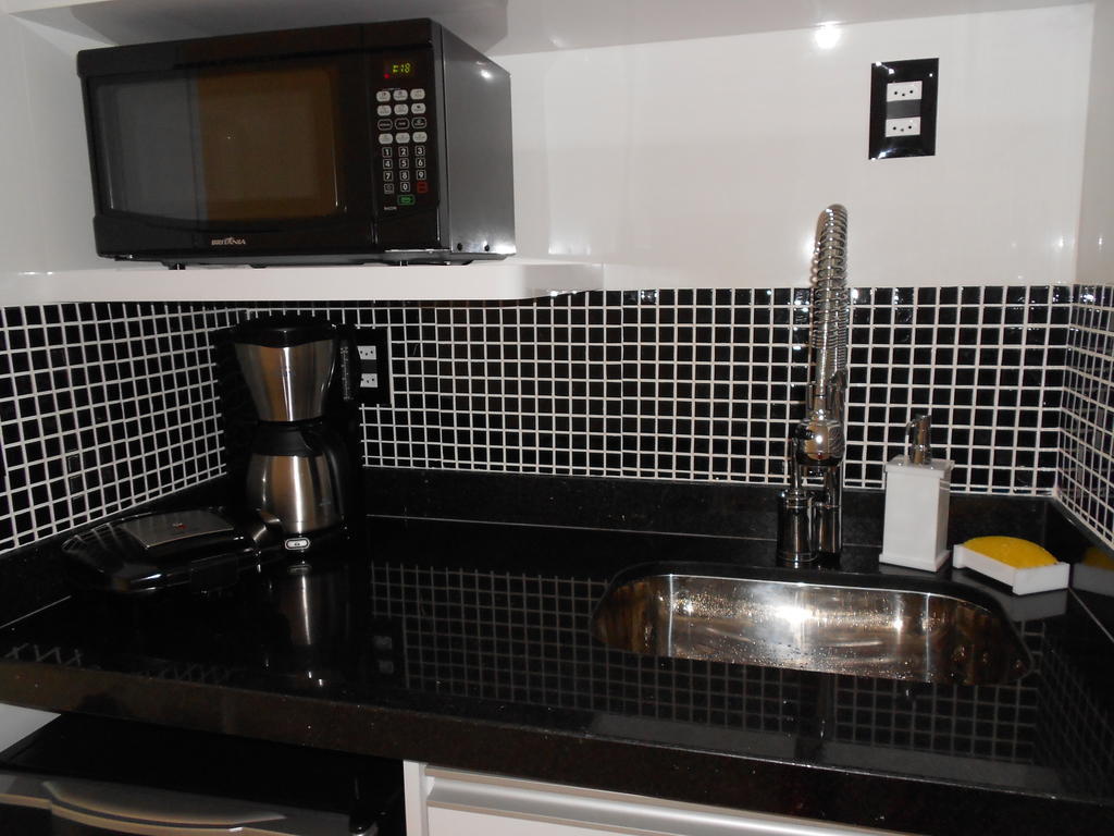 Flat No Hotel Cavalinho Branco อากวัสจิลิงดอยา ห้อง รูปภาพ